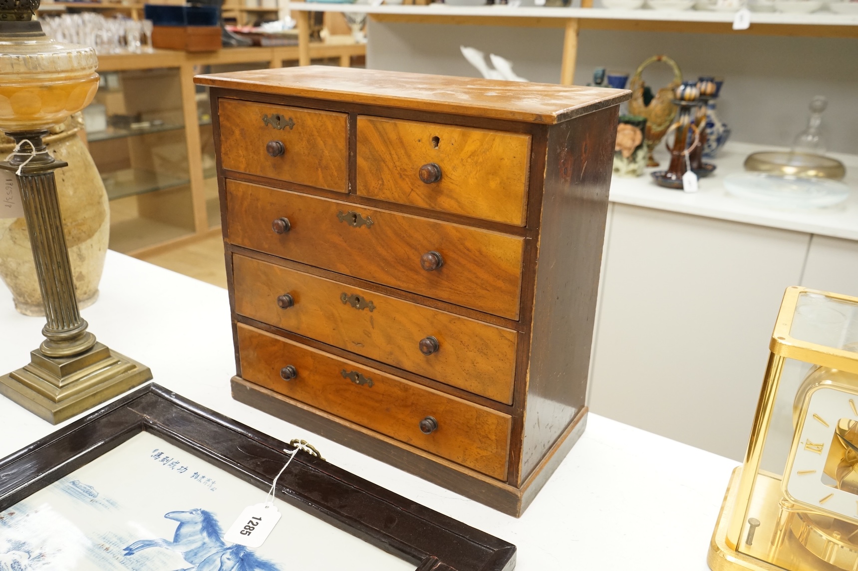 A Victorian walnut table-top chest with five drawers, 39cm high